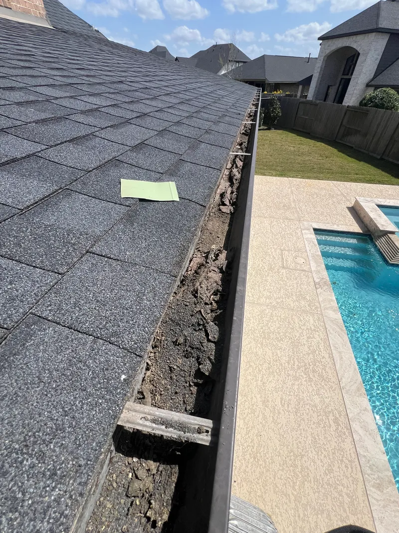 JAG Exteriors gutter installation team